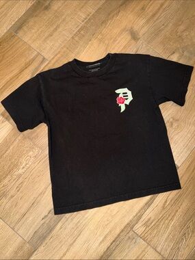 Primitive Skateboarding black cotton t-shirt with white rose graphic